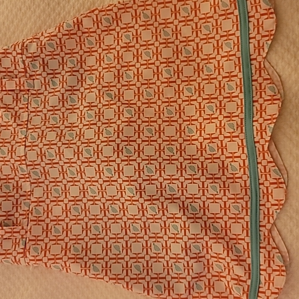 A cute golf score that is pink and teal until from turtles and t's a small.